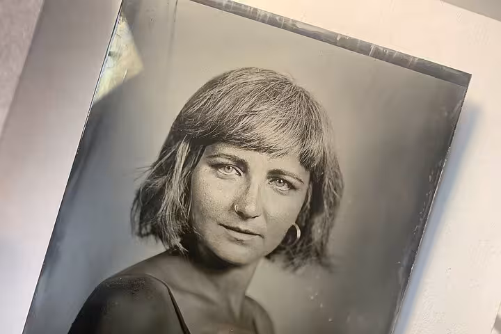 Handcrafted 19th-century metal portrait in Porto, Portugal, featuring a vintage-style studio headshot