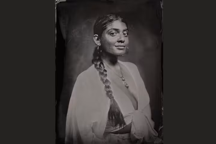 Vintage 19th-century metal plate portrait of a woman, authentic tintype experience in Porto, Portugal studio