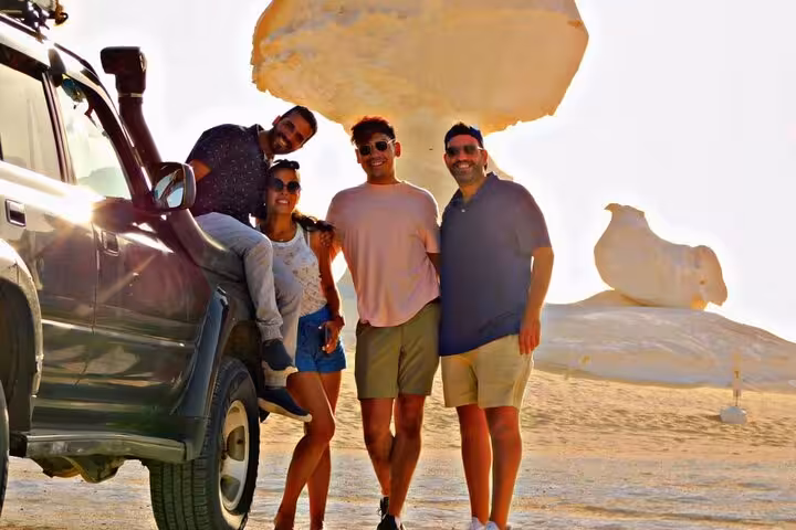 Group by 4x4 at White Desert mushroom rock on private 2-day Black and White Desert camping experience