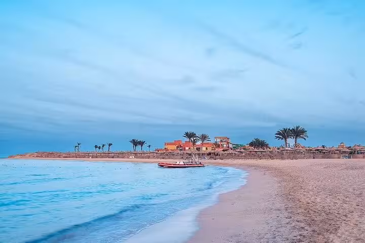 Abu Dabab Beach shoreline with calm Red Sea waters, part of a full-day private experience from Hurghada