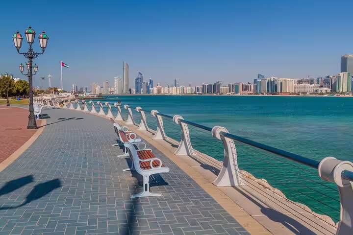 Abu Dhabi Corniche waterfront and skyline view on private day trip from Dubai to Grand Mosque and Palace
