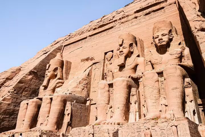 Wide view of Abu Simbel Great Temple statues near Aswan, highlight stop on Luxor to Aswan guided trip
