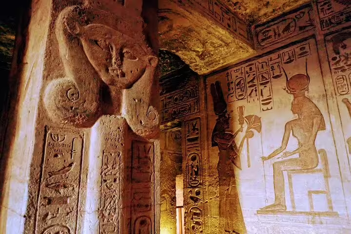 Close-up of Abu Simbel wall carvings and hieroglyphs inside Ramses II temple, Aswan day tour