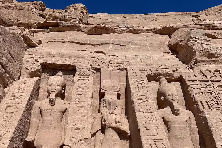 Abu Simbel temple statues and hieroglyphs, must-see ancient Egypt site on Cairo Nile cruise tour