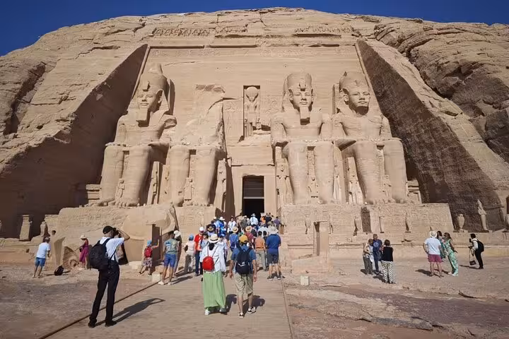 Visitors at Abu Simbel Great Temple of Ramses II on a private day trip from Aswan with hotel pickup