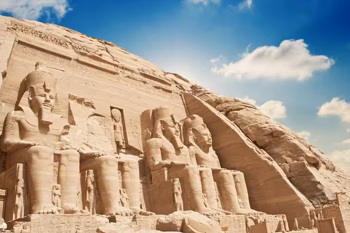 Abu Simbel Great Temple facade with four Ramses II statues, VIP flight tour from Aswan, Egypt