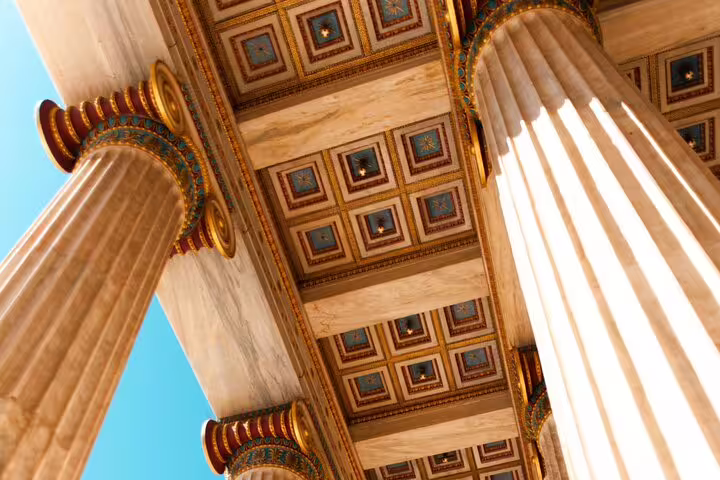 Upward view of Acropolis columns and ornate ceiling on a skip-the-line private Athens city tour