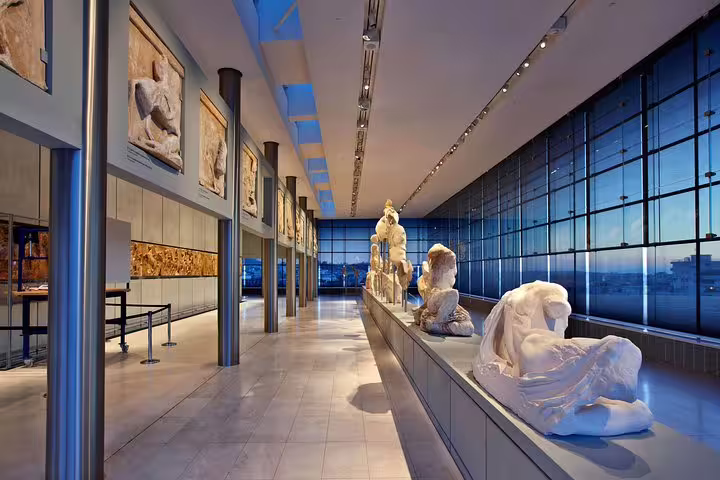 Acropolis Museum gallery with ancient marble statues, a highlight on a full-day private Athens tour