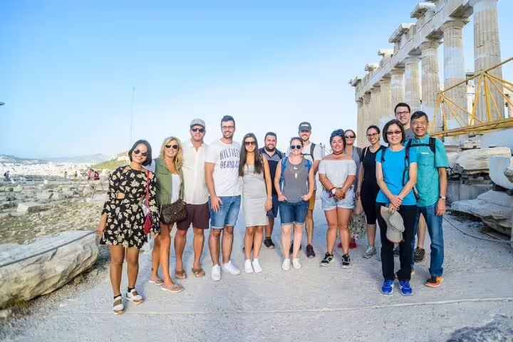 Small group at the Acropolis near the Parthenon on Athens walking tour with a French-speaking guide