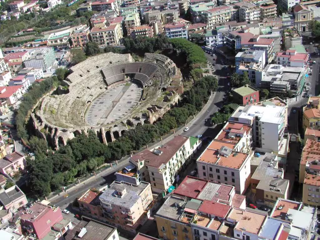 Aerial view of Roman amphitheatre and colorful town near Naples on private Positano and Pompeii shore excursion