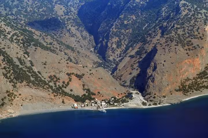Aerial view of Agia Roumeli beach, Samaria Gorge exit, on full-day Samaria Gorge tour from Rethymno