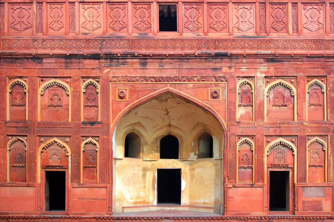 Intricate red sandstone architecture at Agra Fort, a highlight of the Golden Triangle 6 days tour in India.