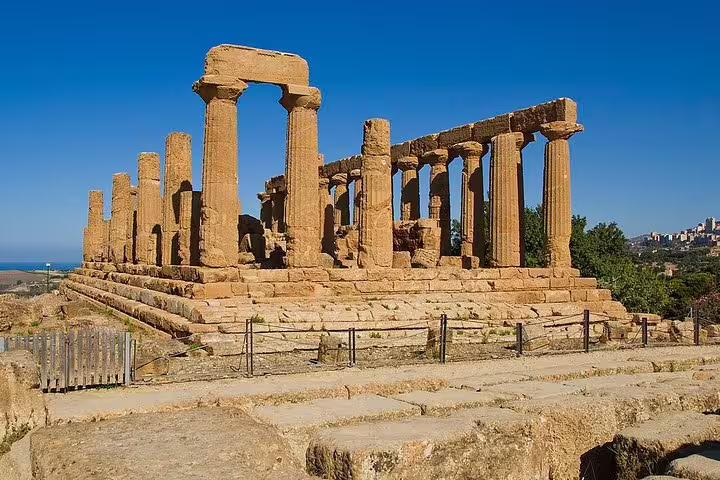 Sunlit Doric temple ruins and panoramic landscape in Agrigento’s Valley of the Temples on a private 2-hour tour