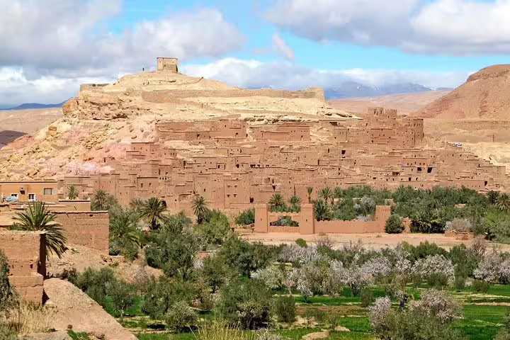 Ait Benhaddou kasbah and oasis valley, iconic Sahara route on Morocco 12 days 11 night desert tour Agadir