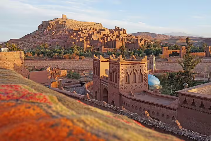 Sunset view of Ait Benhaddou kasbah near Marrakech, a must-see stop on a half-day local sightseeing tour