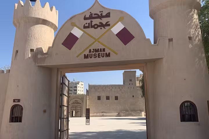 Ajman Museum fort entrance in UAE, highlighting Emirates history, culture and heritage tour attraction