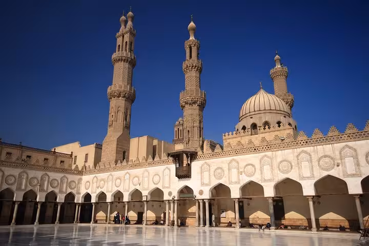 Al-Azhar Mosque courtyard with minarets and domes in Cairo on VIP four-hour Islamic Cairo private tour
