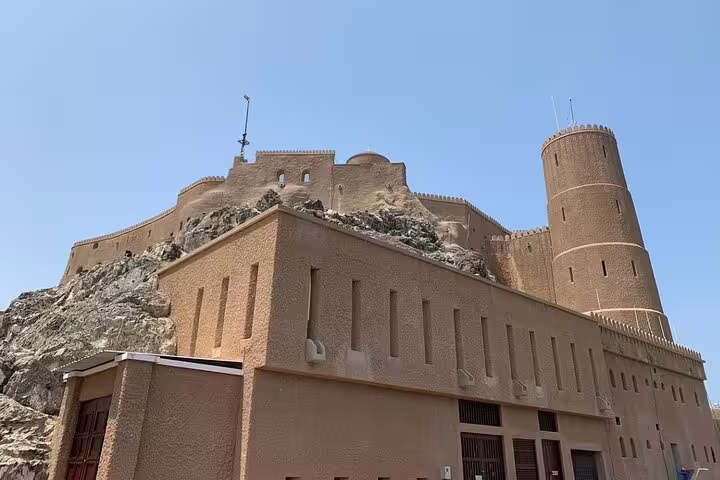 Visit the historical Al Jalali Fort on a half-day private guided Muscat city sightseeing tour.