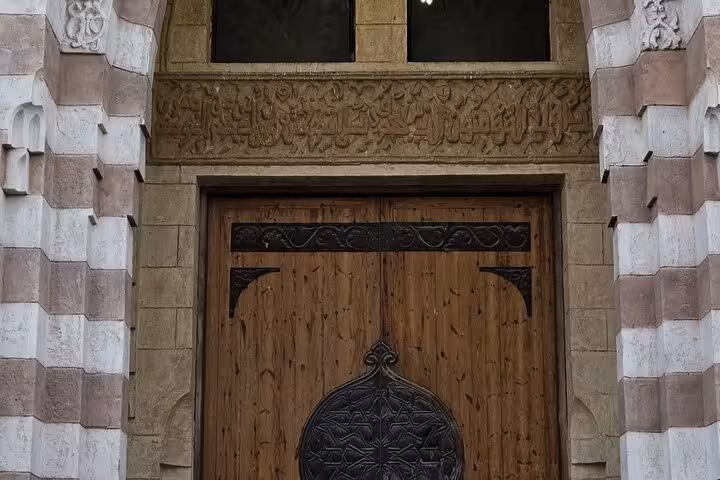 Close-up of Al Mustafa Mosque carved stone and wooden doors, Sharm El Sheikh guided city tour