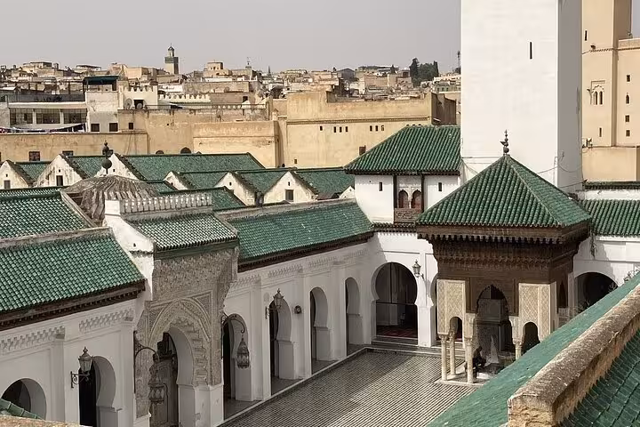 Aerial view of the historic Al Quaraouiyine Mosque's courtyard in Fez's Old Medina.