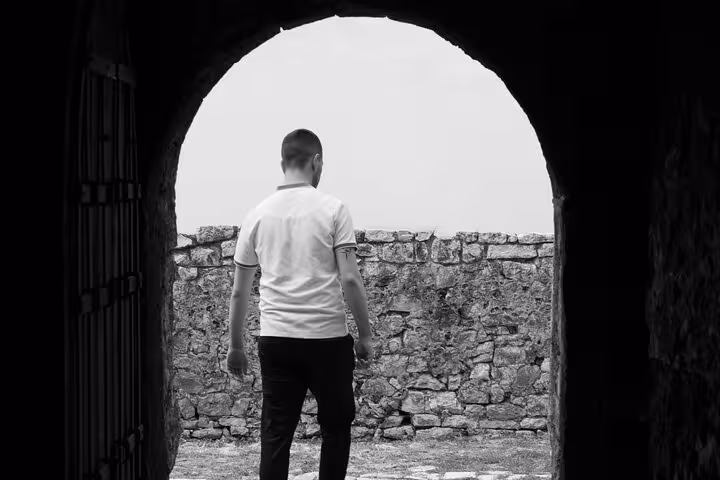 Enjoy breathtaking views through ancient stone arches on a private guided tour of Albania's historic sites.