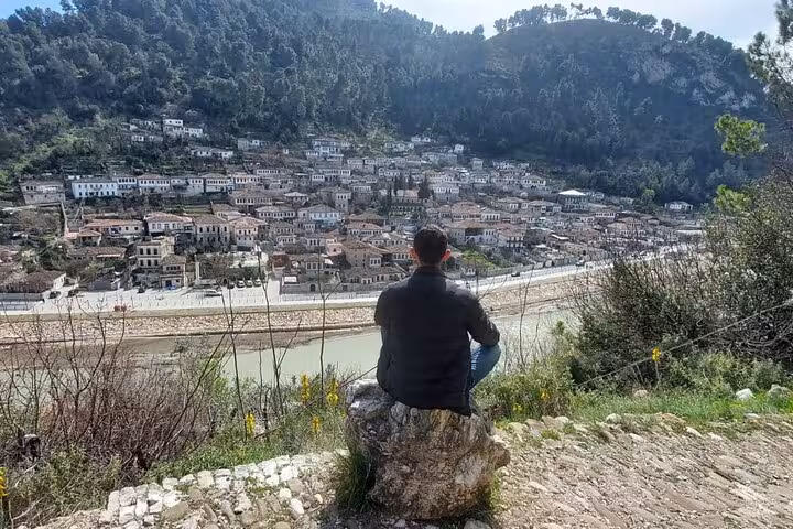 Traveler overlooking the picturesque city of Berat, a highlight on a private guided tour of Albania.