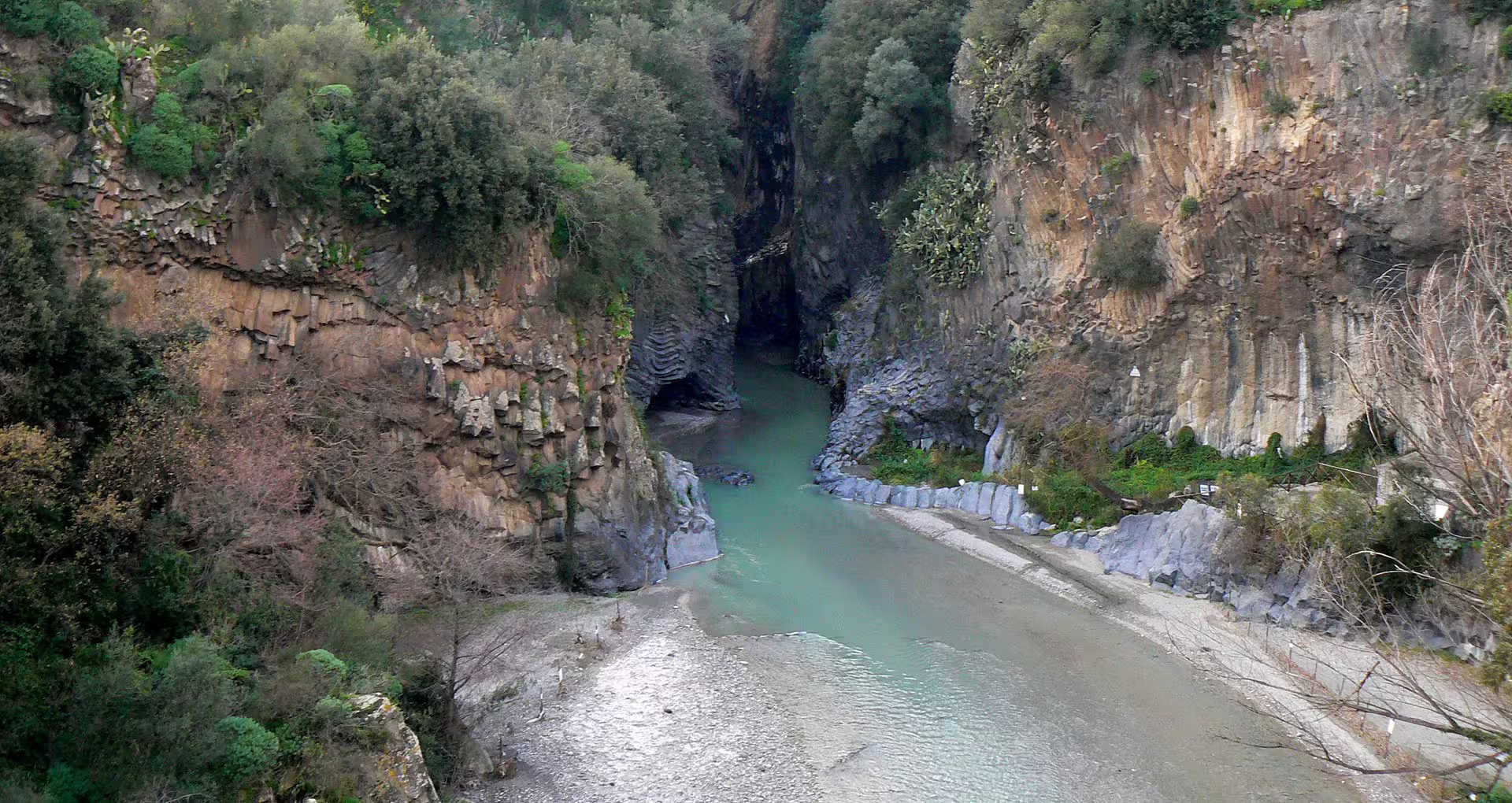 Alcantara Gorges basalt canyon and turquoise river near Taormina, day trip from Catania port