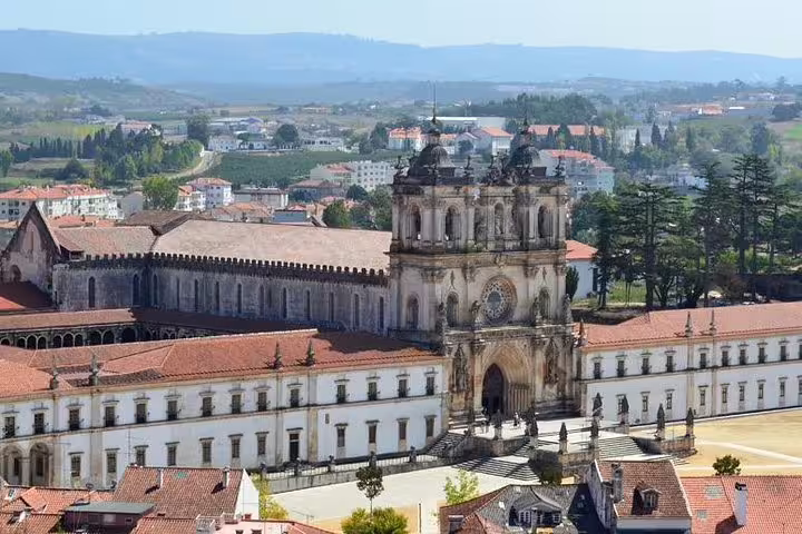 Scenic view of the historic Alcobaça Monastery in Portugal, showcasing stunning architecture on the Fatima Nazare and Obidos tour.