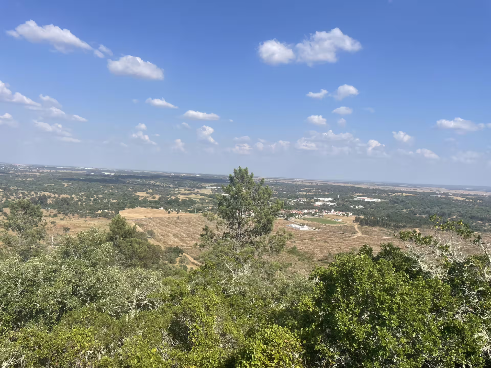 Panoramic view of the scenic Alentejo landscape from the hiking path to Almendres Cromlech near Évora.