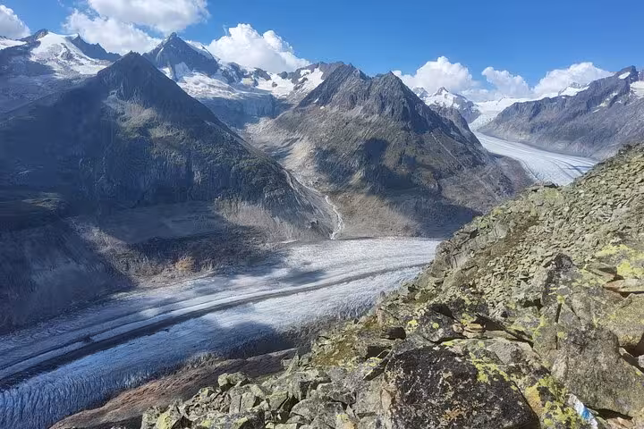 Panoramic view of the Aletsch Glacier from a Swiss Alps lookout on a Zurich day trip to Jungfrau region