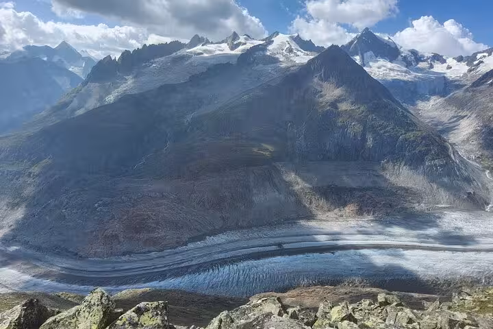 Aletsch Glacier ice flow and surrounding peaks seen from viewpoint on Zurich day trip in the Swiss Alps