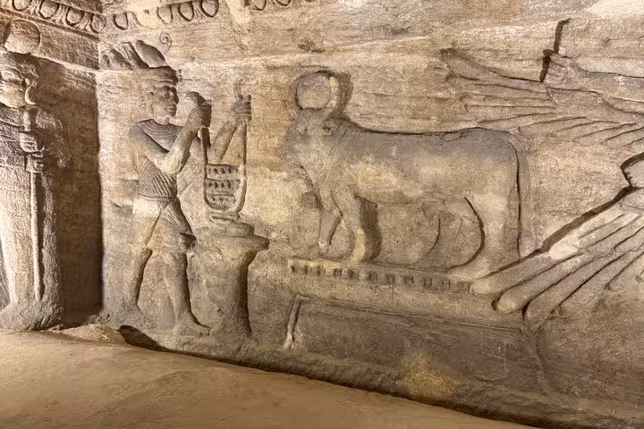 Bas-relief of Anubis and ancient Egyptian figures in Alexandria Catacombs on private VIP day tour with lunch