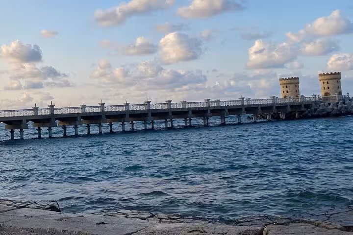 Alexandria Corniche pier and sea towers on a Cairo to Alexandria private tour, Mediterranean coastline view