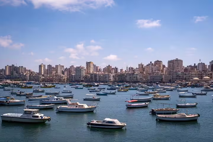 Alexandria harbor skyline with boats on Mediterranean, scenic stop on 2-day Port Said tour of Cairo and Alexandria