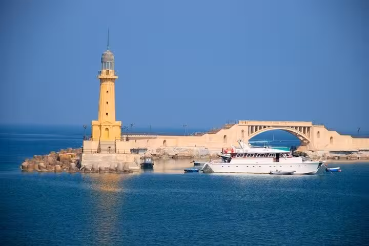 Alexandria lighthouse and harbor bridge with yacht on Mediterranean, highlight of Hurghada to Cairo & Alexandria tour