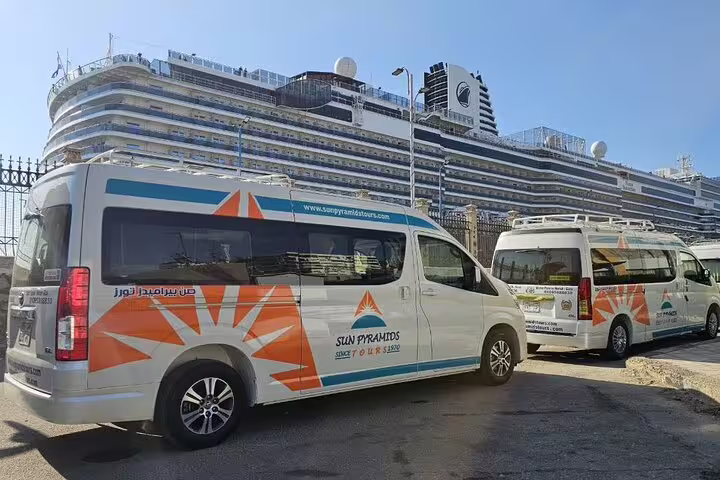 Tour vans at Alexandria Port cruise terminal for Cairo day trip to Giza Pyramids, Citadel and Khan el-Khalili