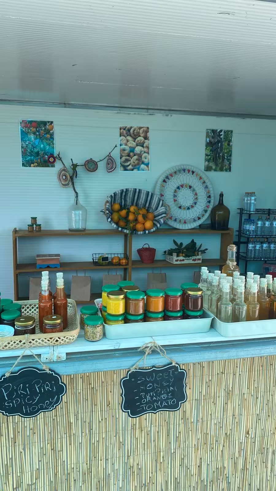 Rustic Algarve farm stall with local honey, jams and liqueurs displayed for tasting on a Sunset Jeep Safari with dinner