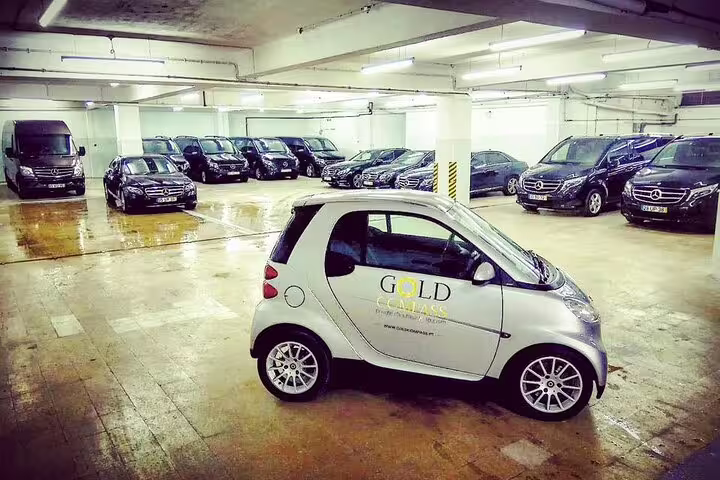 Fleet of luxury vehicles ready for Algarve to Lisbon private journey, offering a comfortable and direct travel experience.