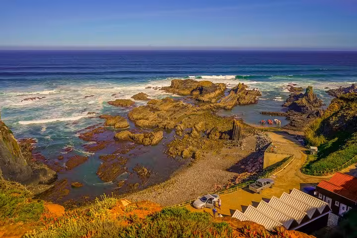 Rocky Atlantic coastline viewpoint stop on Algarve to Lisbon private transfer, scenic Portugal ocean panoramas