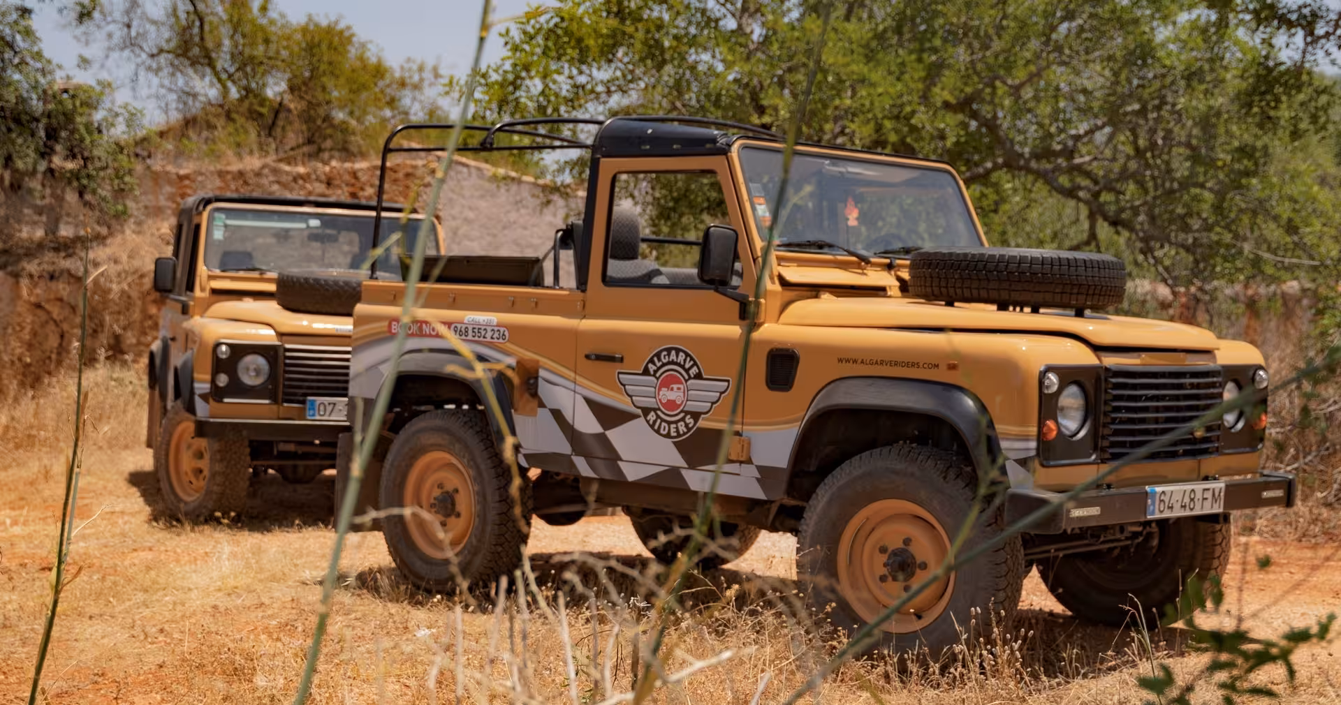 Open-top Algarve Riders jeeps parked on a dusty trail, ready for a Spirit & Springs off-road adventure tour