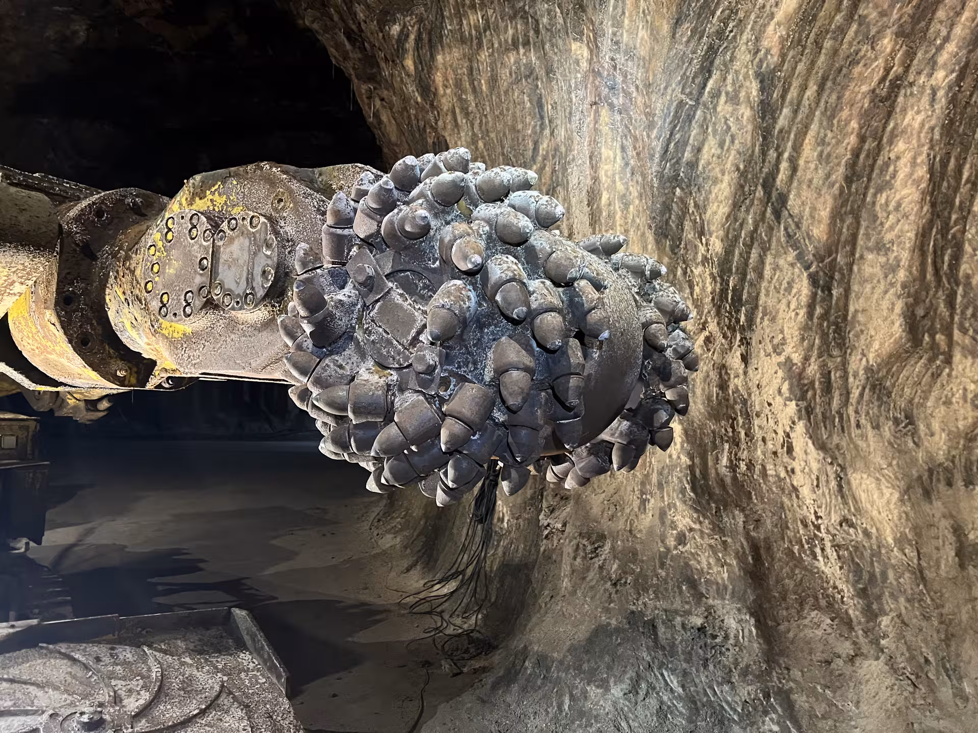 Close-up of mining drill head in Loulé rocksalt mine, showcasing machinery used during Algarve guided tours.