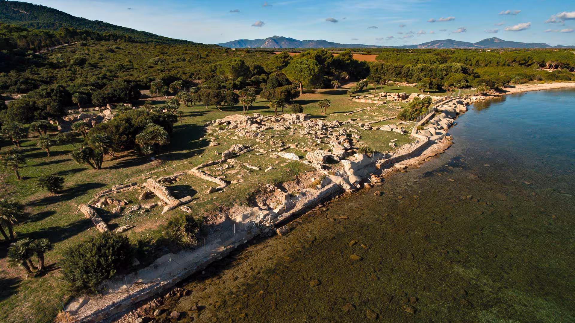 Discover the serene blend of history and nature along the coastline at Porto Conte Park Ecomuseum, Alghero.