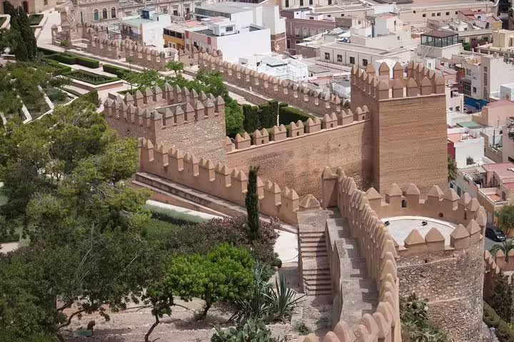 Historic fortress walls and lush gardens in Granada, perfect for cruise passengers exploring Alhambra from Malaga Port tour.