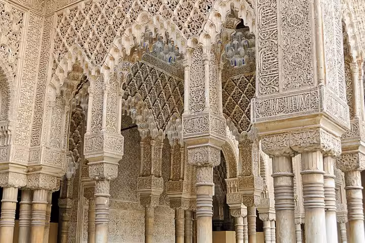 Intricate Moorish architecture of Alhambra Palace in Granada, a highlight of the Andalucia and Madrid tour.
