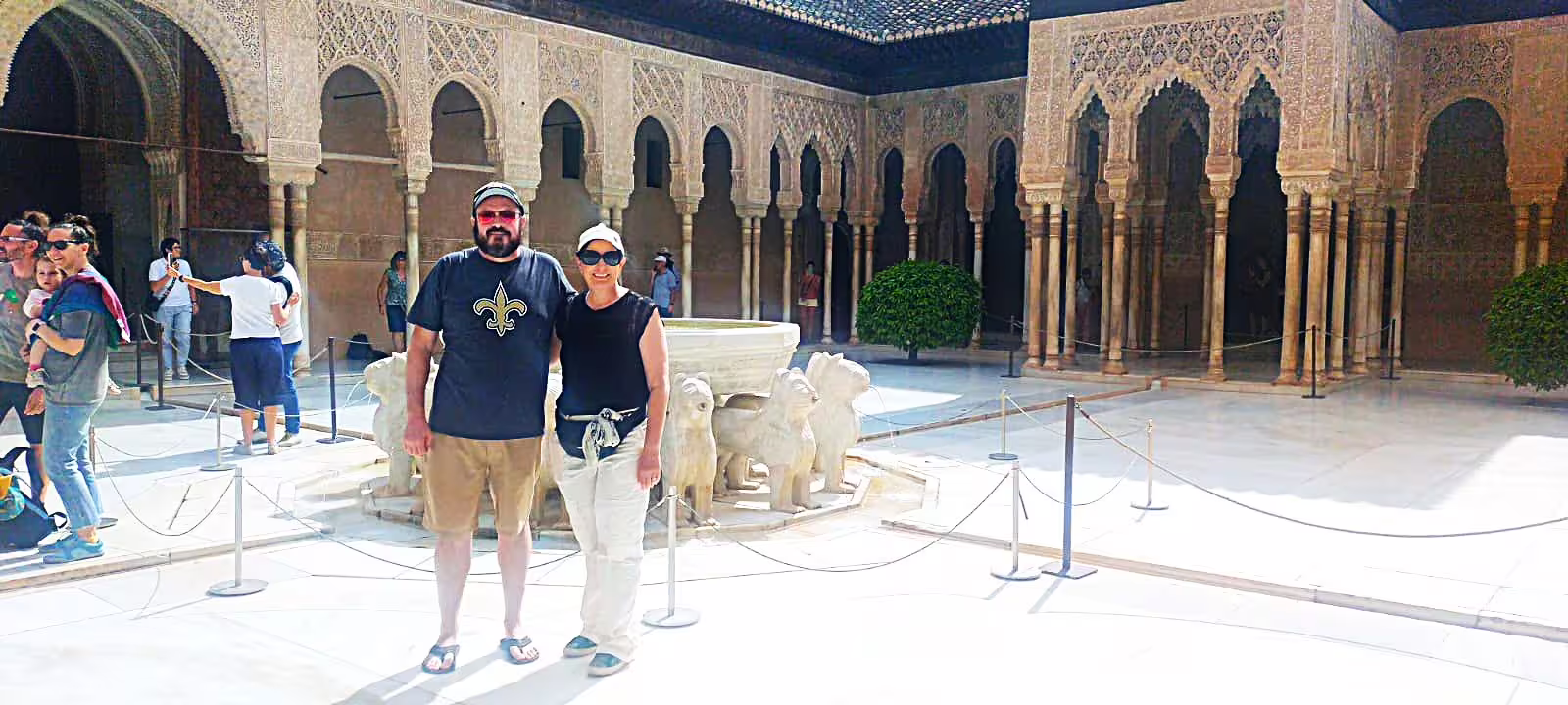 Couple at Alhambra Palace Granada by the Fountain of the Lions on a private tour from Costa del Sol