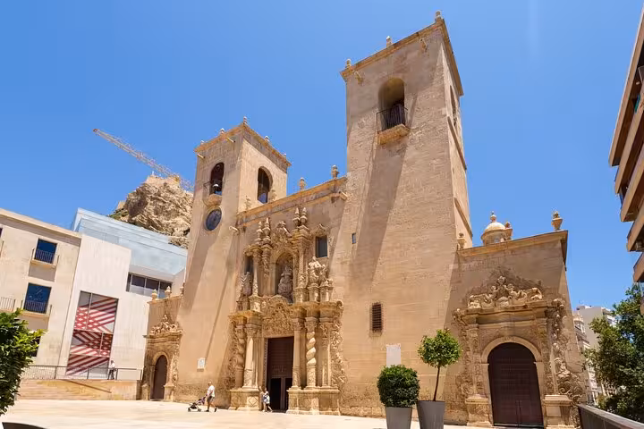 Stunning view of Alicante's historic cathedral under a clear blue sky, ideal for a guided intro city walk.
