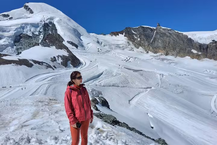 Guest at Allalin glacier lookout above Saas-Fee, part of Zurich day trip to the highest revolving restaurant