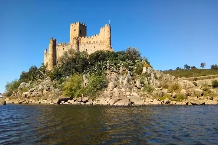 Explore Almourol Castle on a scenic island during the Private Tour of 1 to 8 Templars, offering stunning river views.