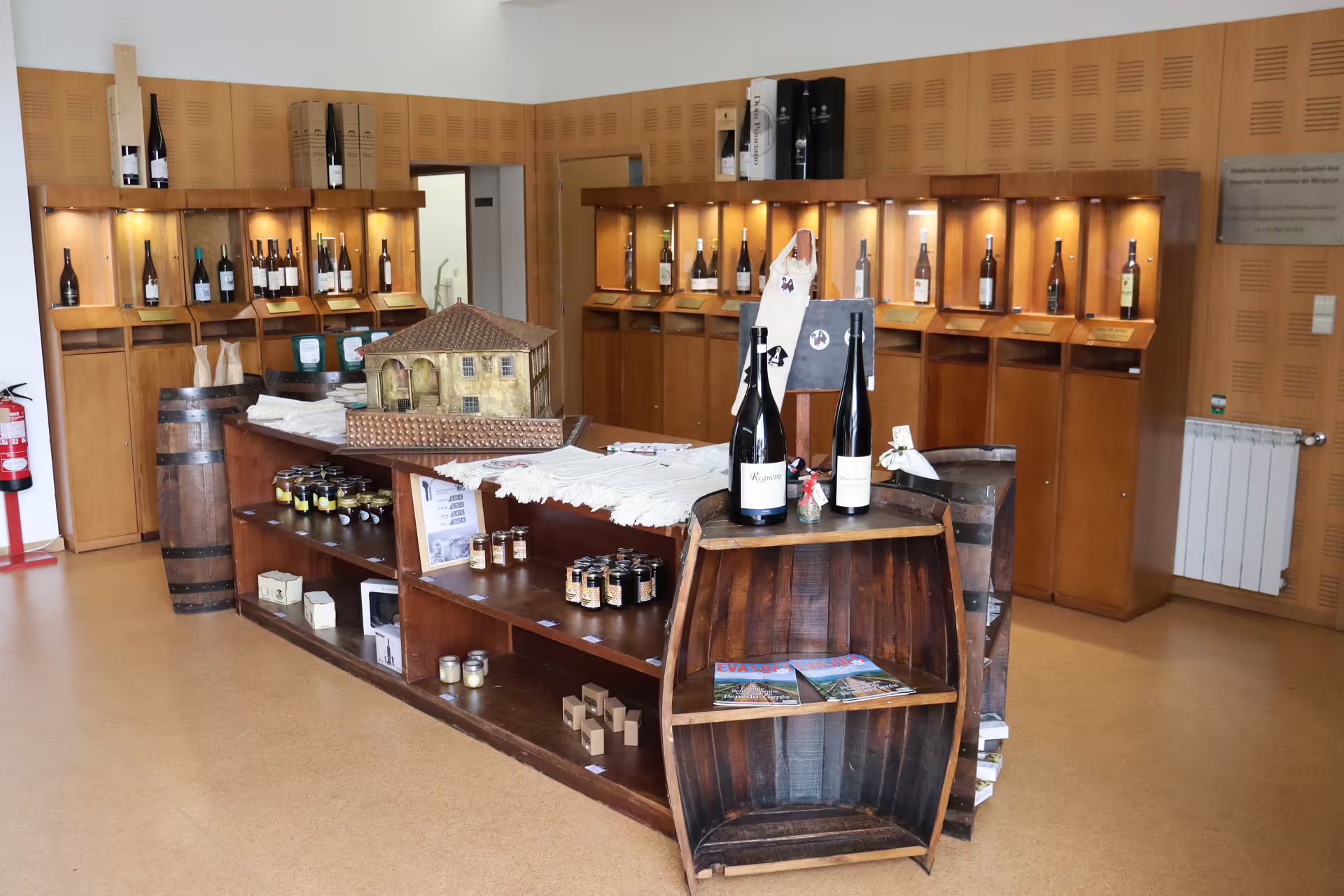 Wine tasting room showcasing Alvarinho bottles and local products in Melgaço and Monção tour, Portugal wine region.