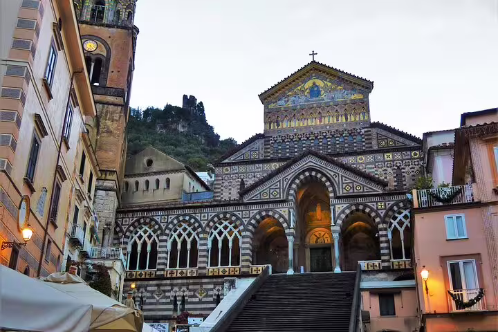 Amalfi Cathedral Duomo di Sant’Andrea facade at dusk on THE AMALFITAN DREAM VIP small-group tour